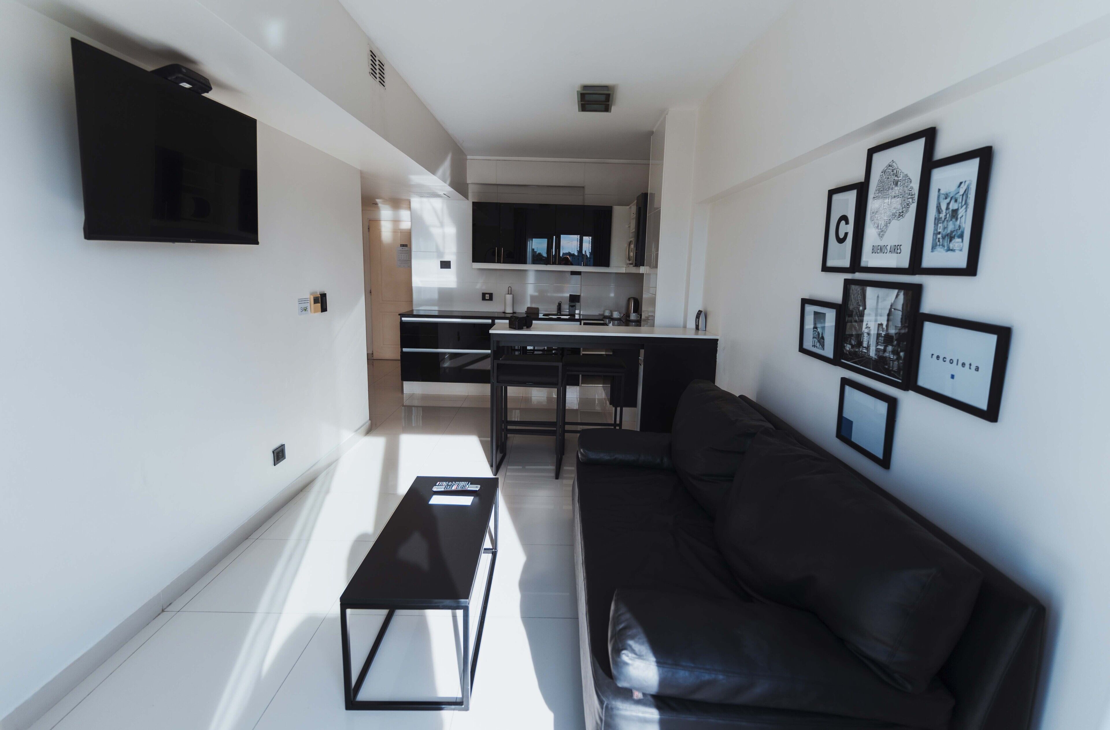 Suite, vistas a la ciudad | Ropa de cama de alta calidad y edredones de plumas