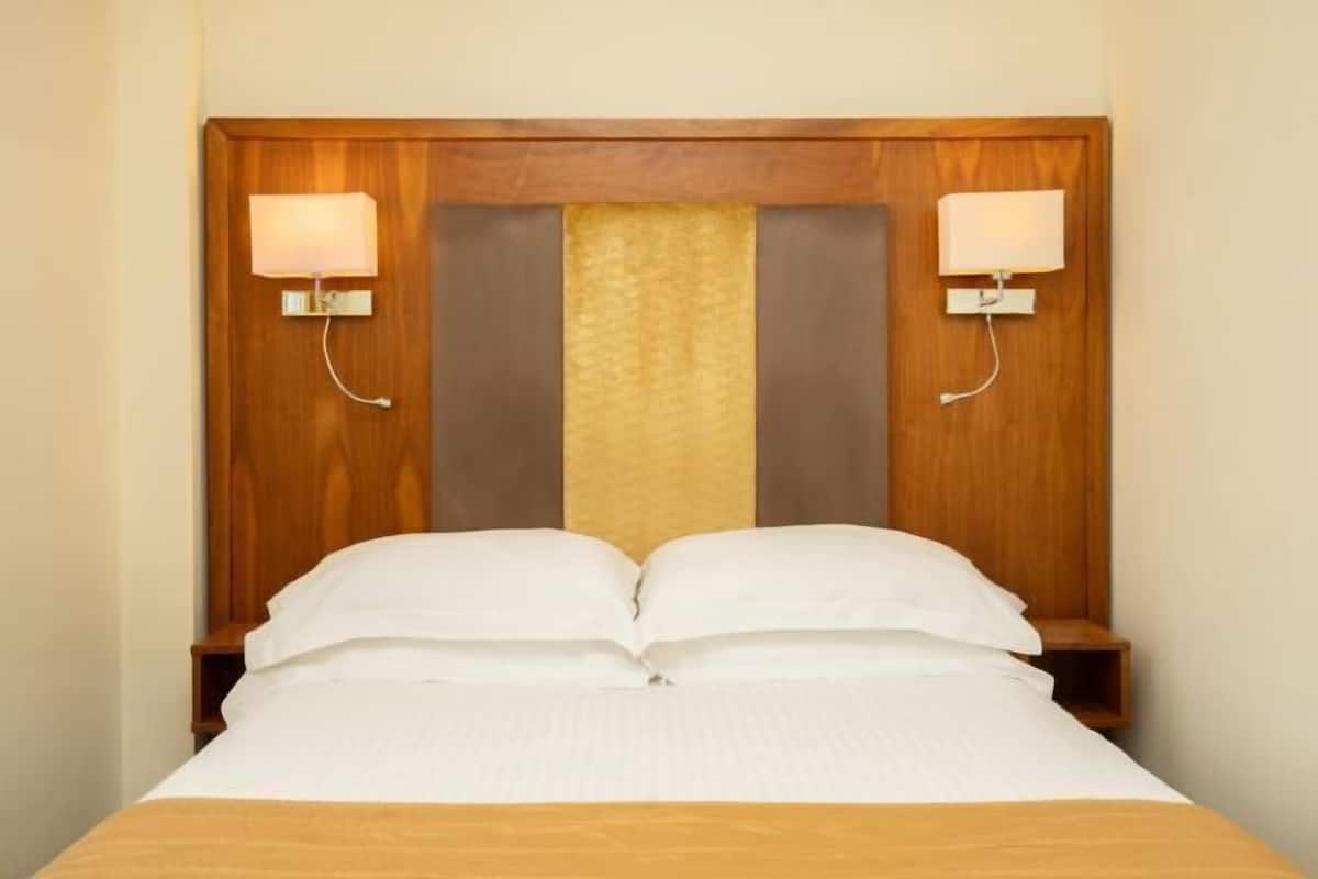 In-room safe, desk, laptop workspace, iron/ironing board