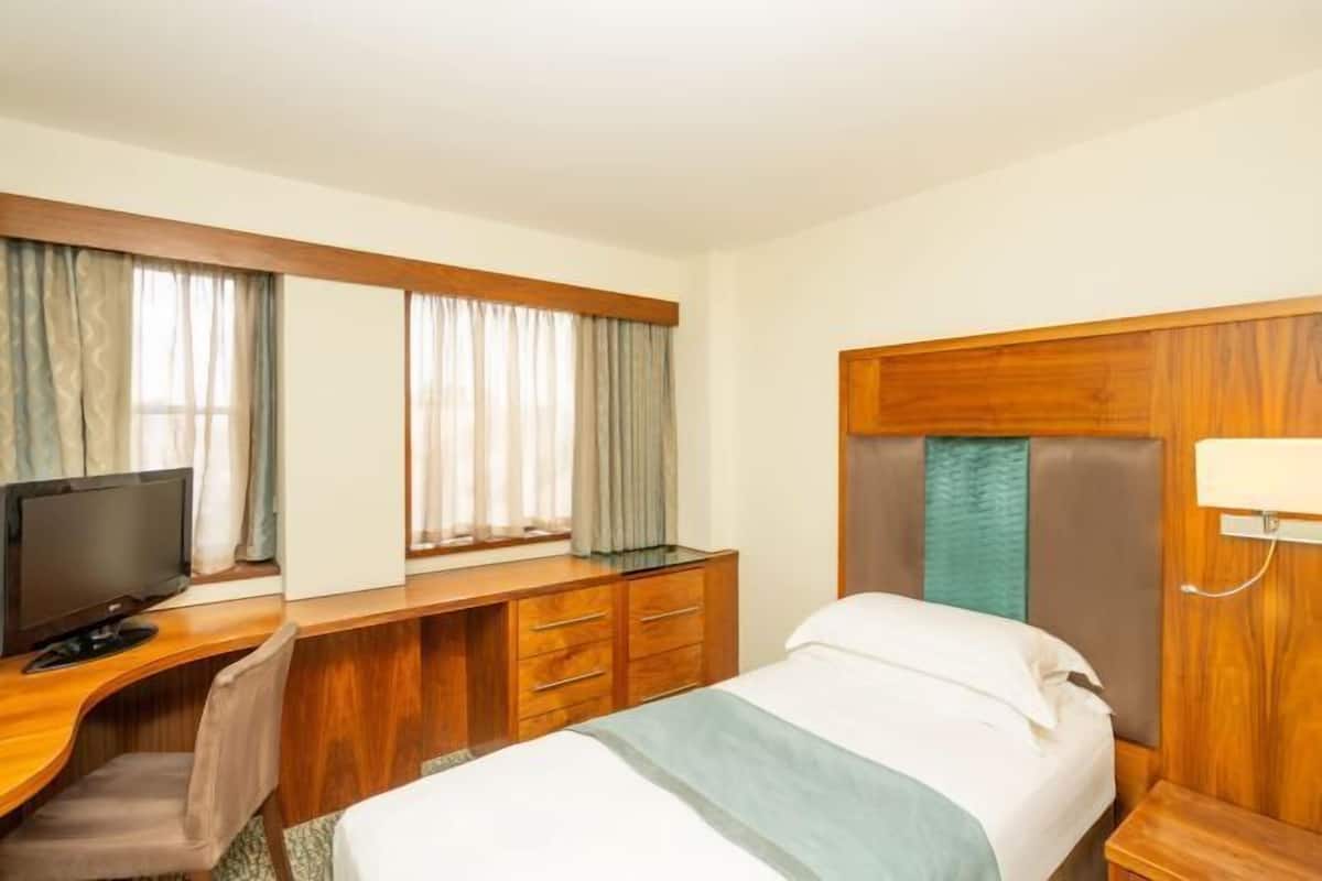 In-room safe, desk, laptop workspace, iron/ironing board