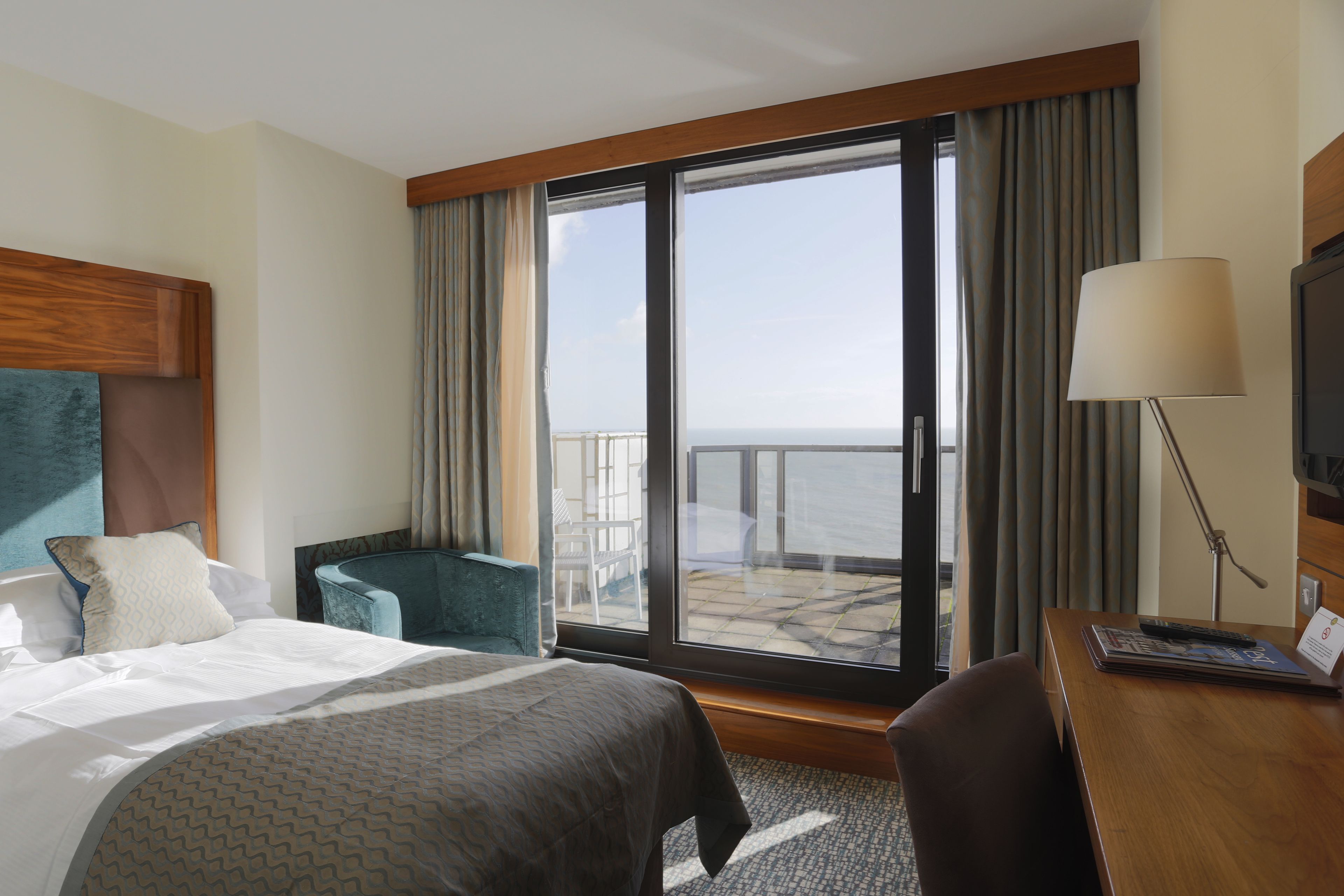 premium single room | in-room safe, desk, laptop workspace, iron/ironing board