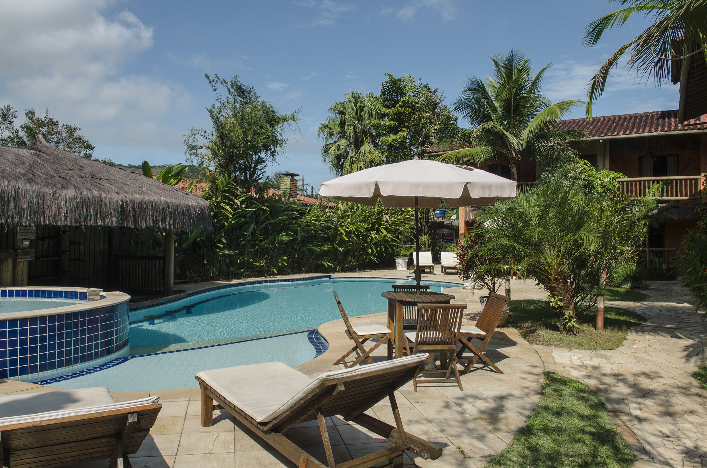 Outdoor pool, pool umbrellas, sun loungers