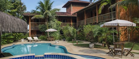 Outdoor pool, pool umbrellas, sun loungers