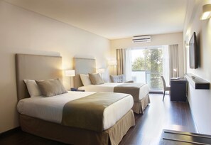 Premium bedding, pillow-top beds, minibar, in-room safe