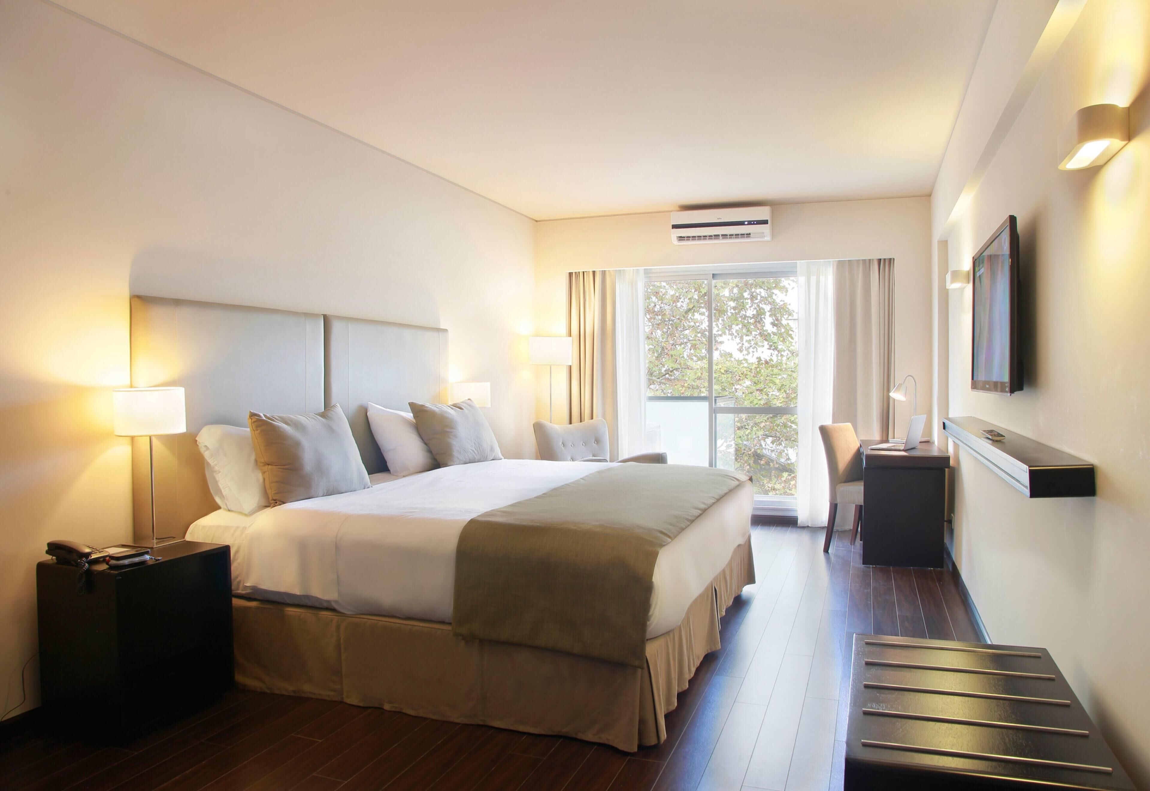 Premium bedding, pillow-top beds, minibar, in-room safe