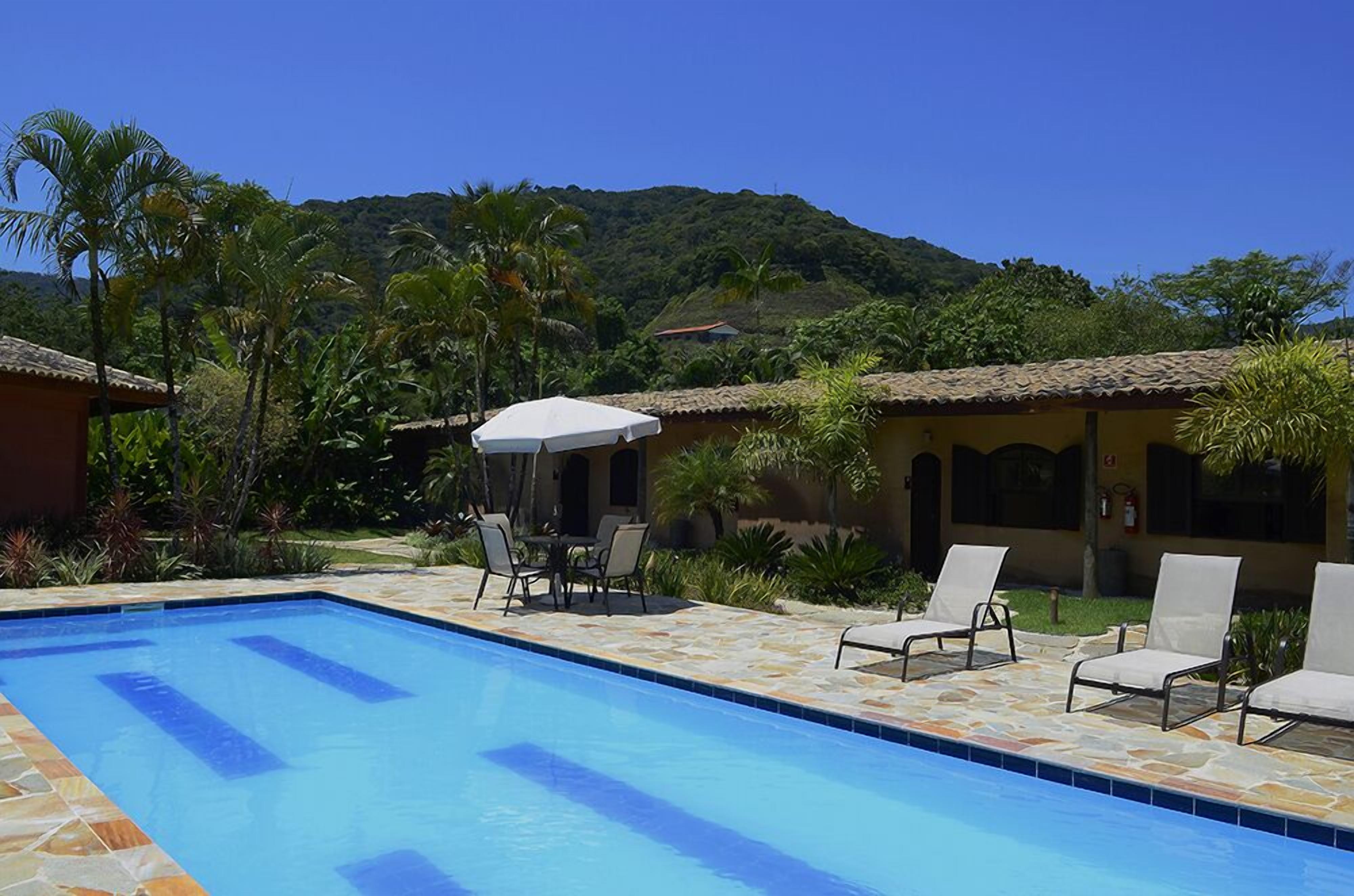 Outdoor pool, pool umbrellas, sun loungers