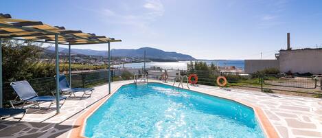 Seasonal outdoor pool, sun loungers
