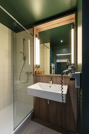 Eco-friendly toiletries, hair dryer, towels