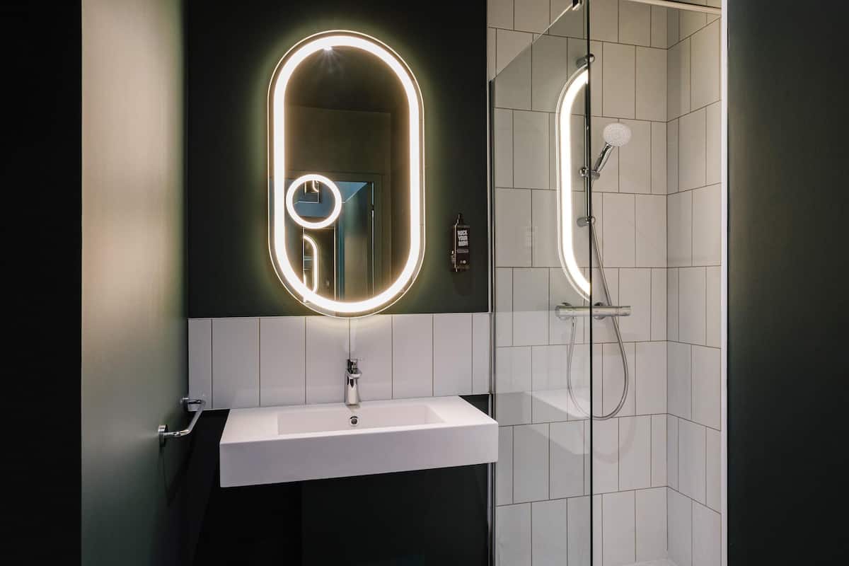 premium bedding, desk, laptop workspace, blackout curtains