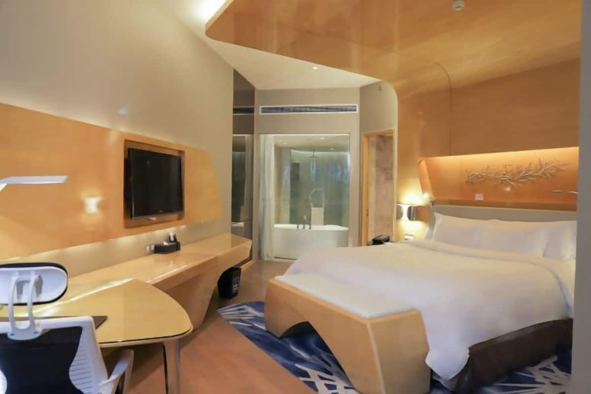 Down duvets, pillow-top beds, minibar, in-room safe