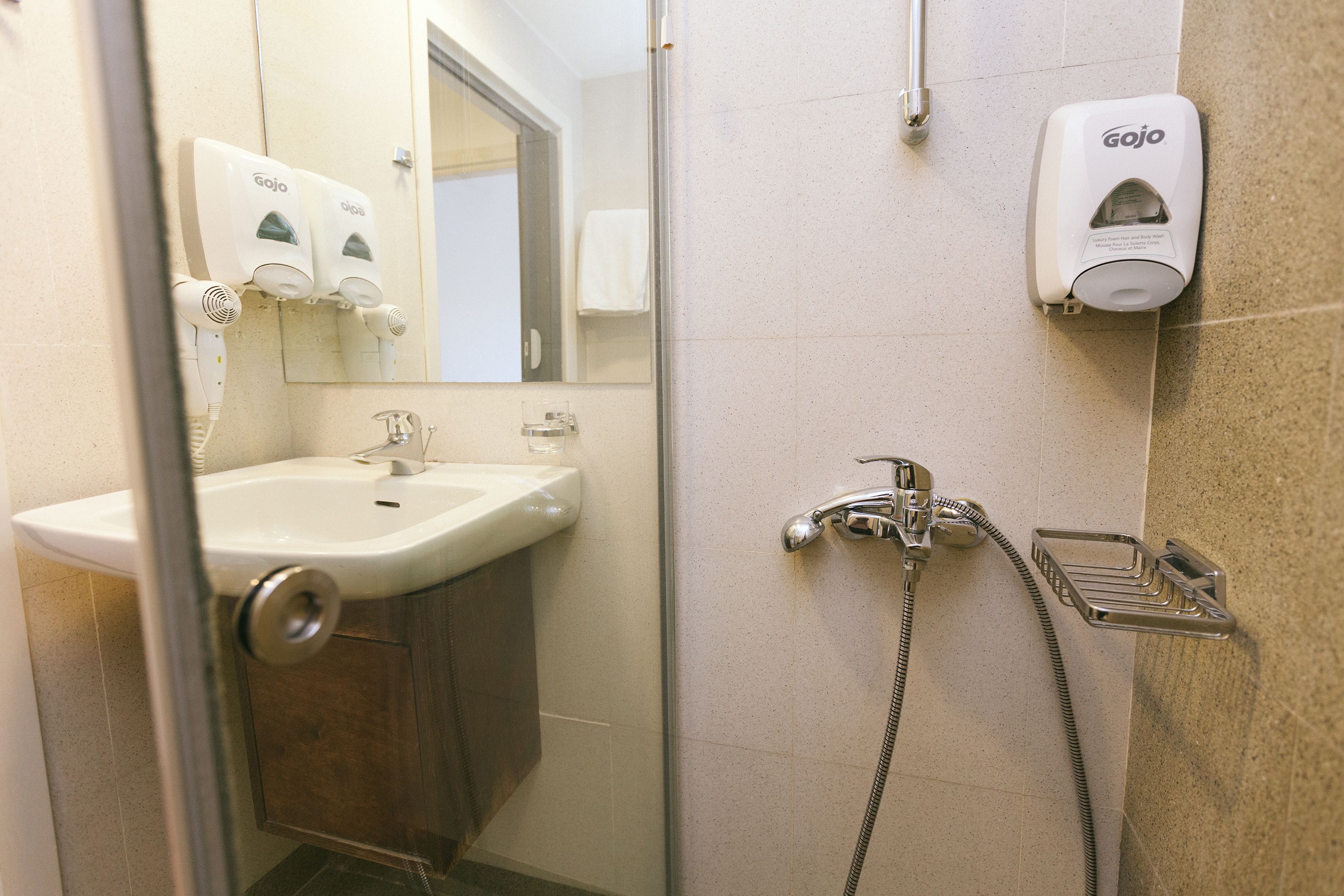 twin room, lake view | bathroom | free toiletries, hair dryer, towels