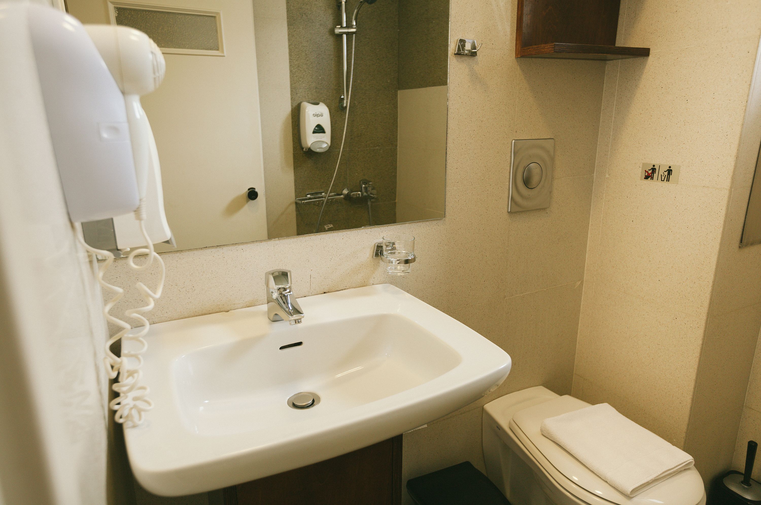 twin room, city view | bathroom | free toiletries, hair dryer, towels