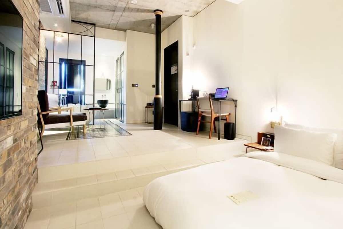 Egyptian cotton sheets, down duvets, memory-foam beds, free minibar