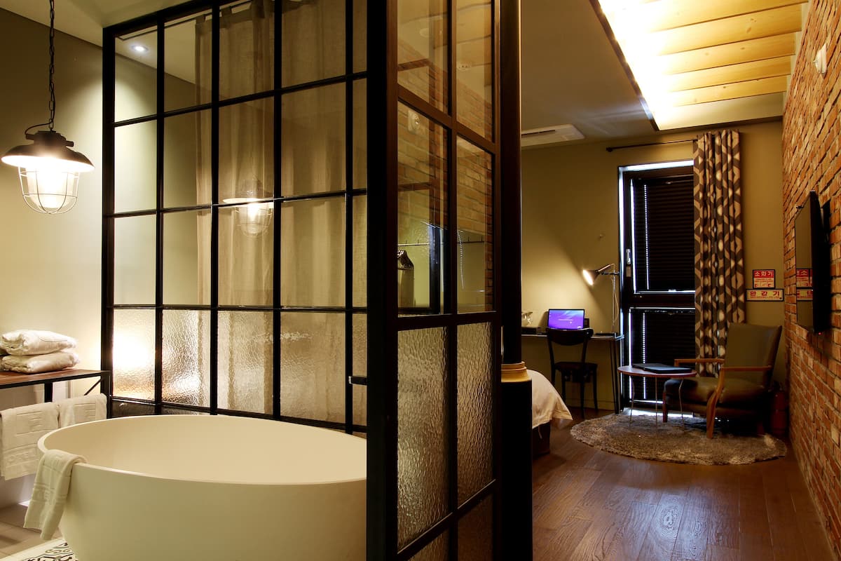 Superior Double Room (Bathtub or shower depend on room type) | Egyptian cotton sheets, down comforters, memory foam beds, free minibar