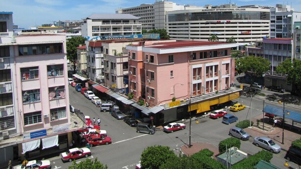 A multi-story building with a flat roof, surrounded by other buildings. - Park Hotel (Kota Kinabalu)