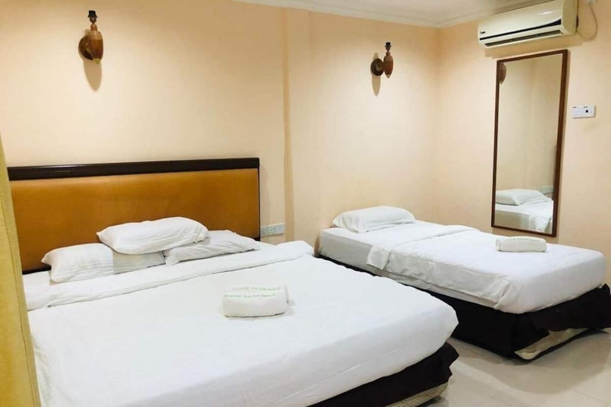 Kamar Triple | Seprai premium dan tempat tidur lipat/tambahan