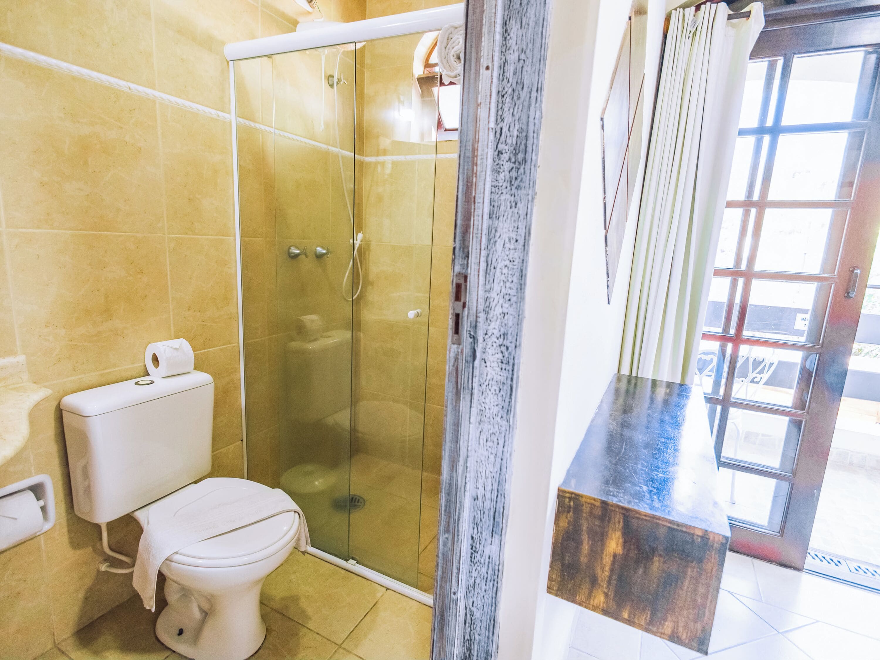 deluxe room | bathroom | shower, designer toiletries, hair dryer, towels