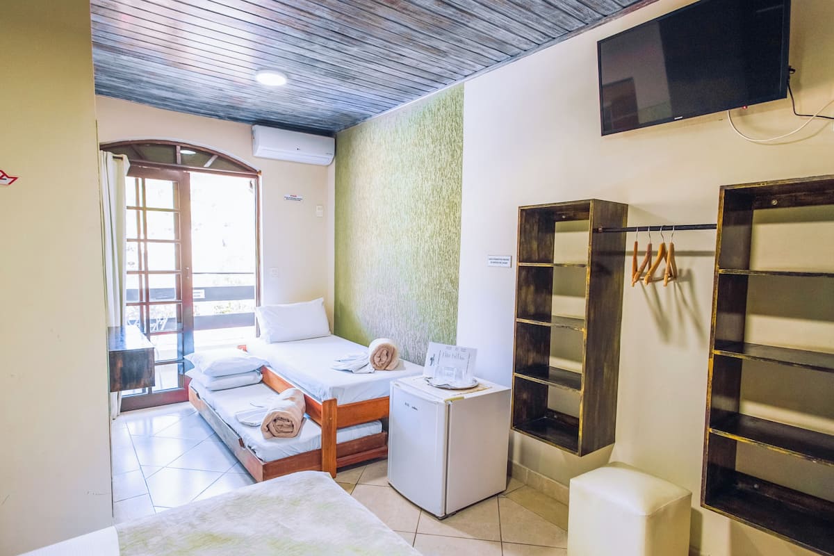 Deluxe kamer | 14 slaapkamers, luxe beddengoed, een minibar, verduisterende gordijnen