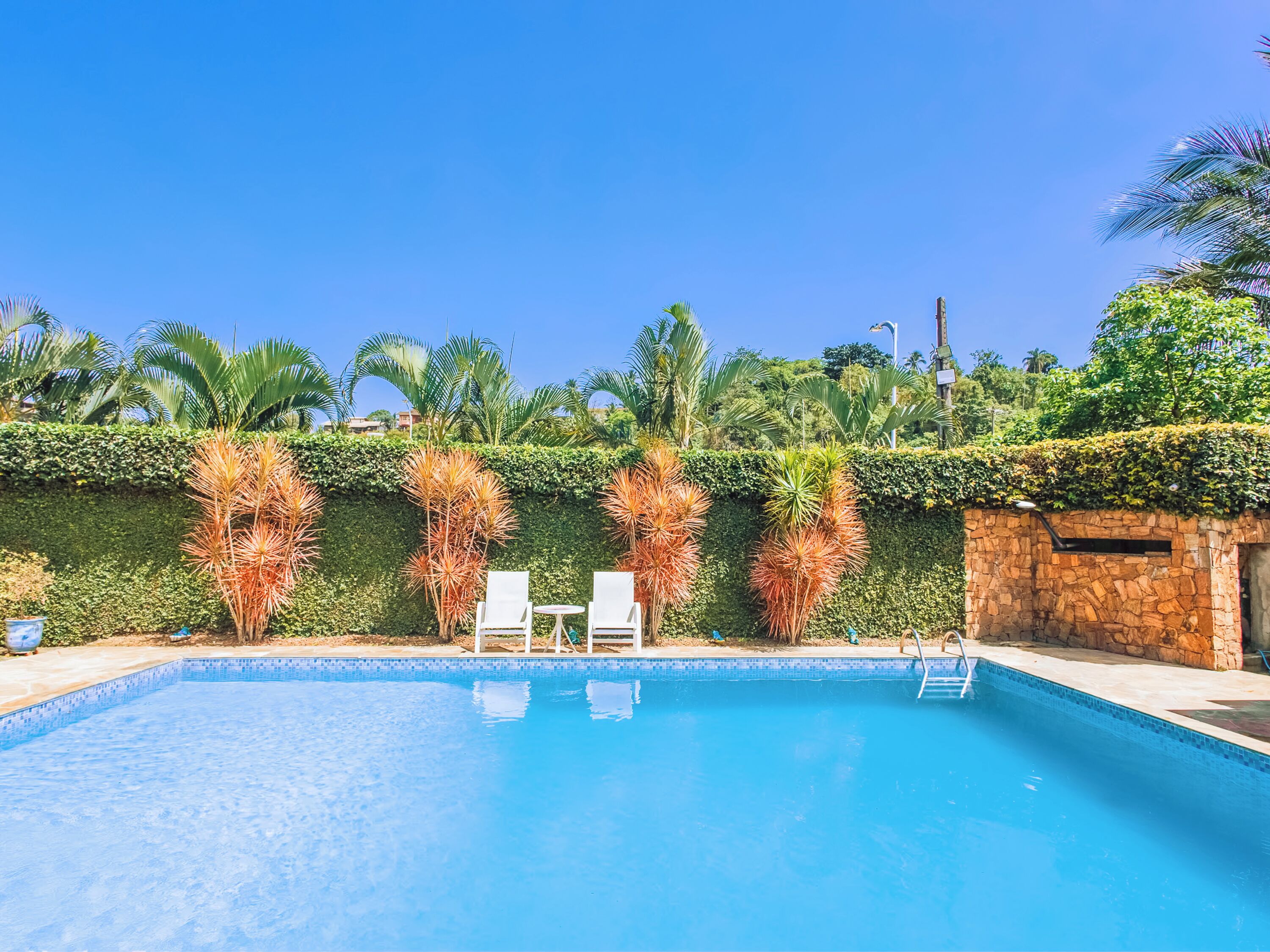 outdoor pool, open 10:00 am to 10:00 pm, pool umbrellas, pool loungers