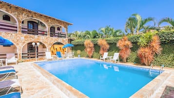 Outdoor pool, open 10:00 AM to 10:00 PM, pool umbrellas, pool loungers