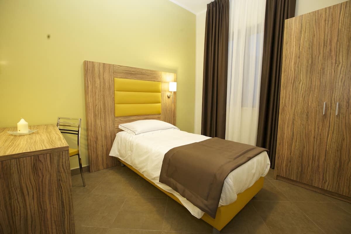 Single Room | Down comforters, minibar, in-room safe, individually decorated