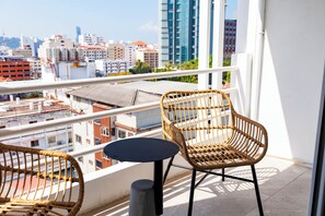 Deluxe with Balcony | Minibar, in-room safe, desk, blackout drapes - The One Hotel Bay Breeze Pattaya (Pattaya)