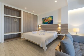 Down duvets, pillow-top beds, in-room safe, desk