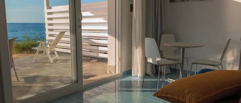 Panoramic Suite, Sea View | Down duvets, pillow-top beds, in-room safe, desk