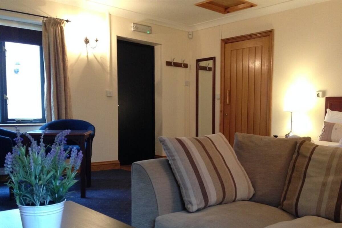 Suite, baño privado (Nelson) | Sala de estar