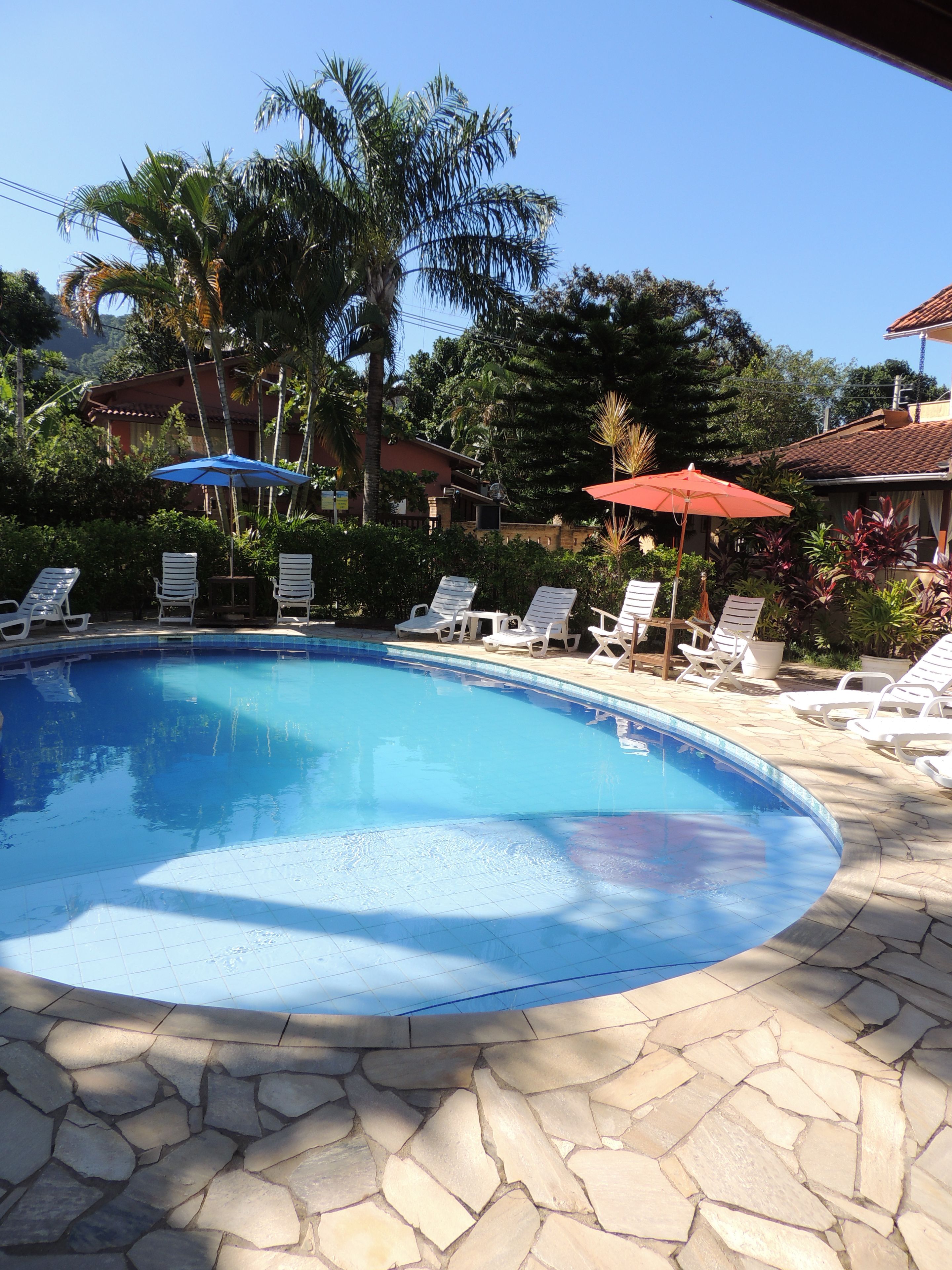 2 outdoor pools, open 9 am to 10 pm, pool umbrellas, pool loungers