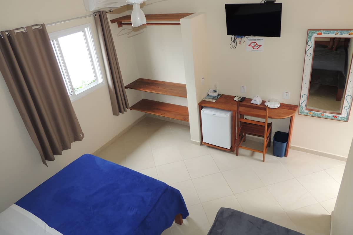 Standard Quadruple Room, 1 Bedroom, Private Bathroom, Garden View | Premium bedding, minibar, blackout drapes, free cribs/infant beds