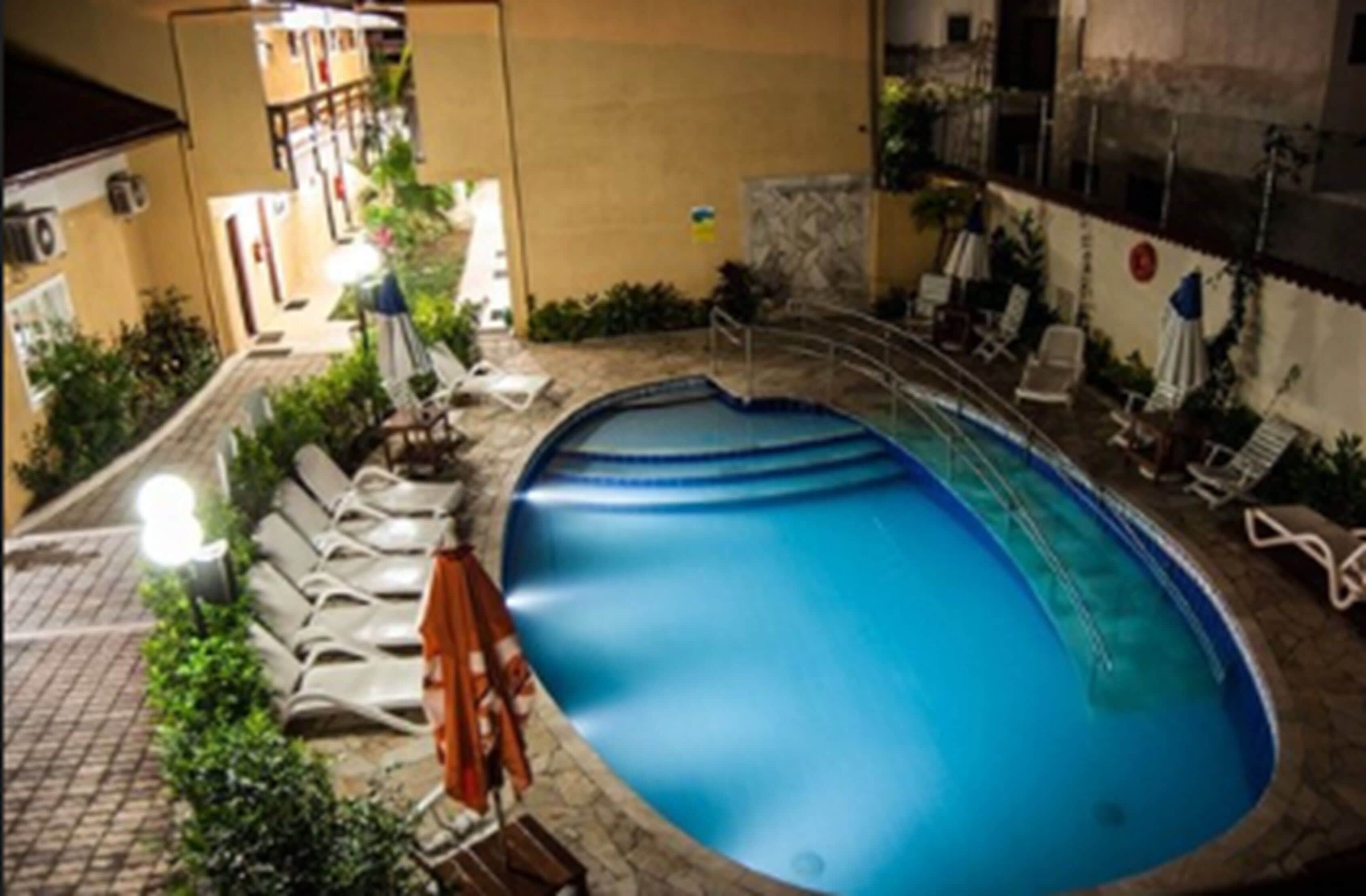 2 outdoor pools, open 9 am to 10 pm, pool umbrellas, pool loungers