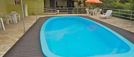 Outdoor pool, pool umbrellas, pool loungers