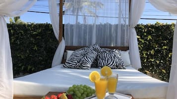 Outdoor pool, open 7:00 AM to 10:30 PM, pool umbrellas, sun loungers