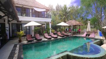 Outdoor pool, pool umbrellas, pool loungers