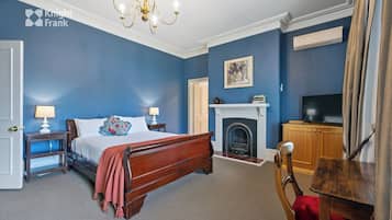 Superior Queen Suite - First Floor | Minibar, individually decorated, iron/ironing board, free WiFi
