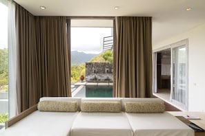 Varda Suite, Private Pool, Mountain View | Living room | LCD TV