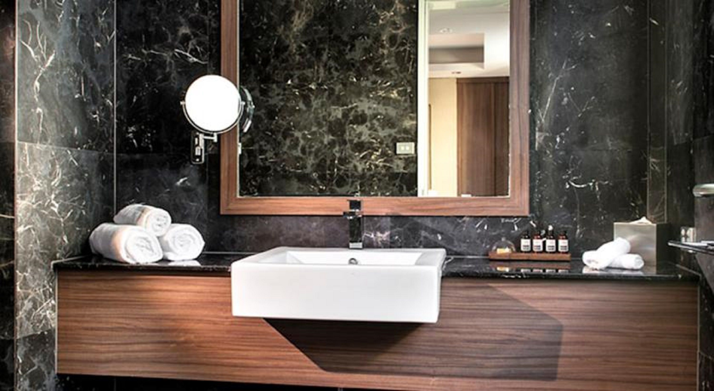 stateroom with complimentary continental breakfast | bathroom | shower, designer toiletries, hair dryer, towels