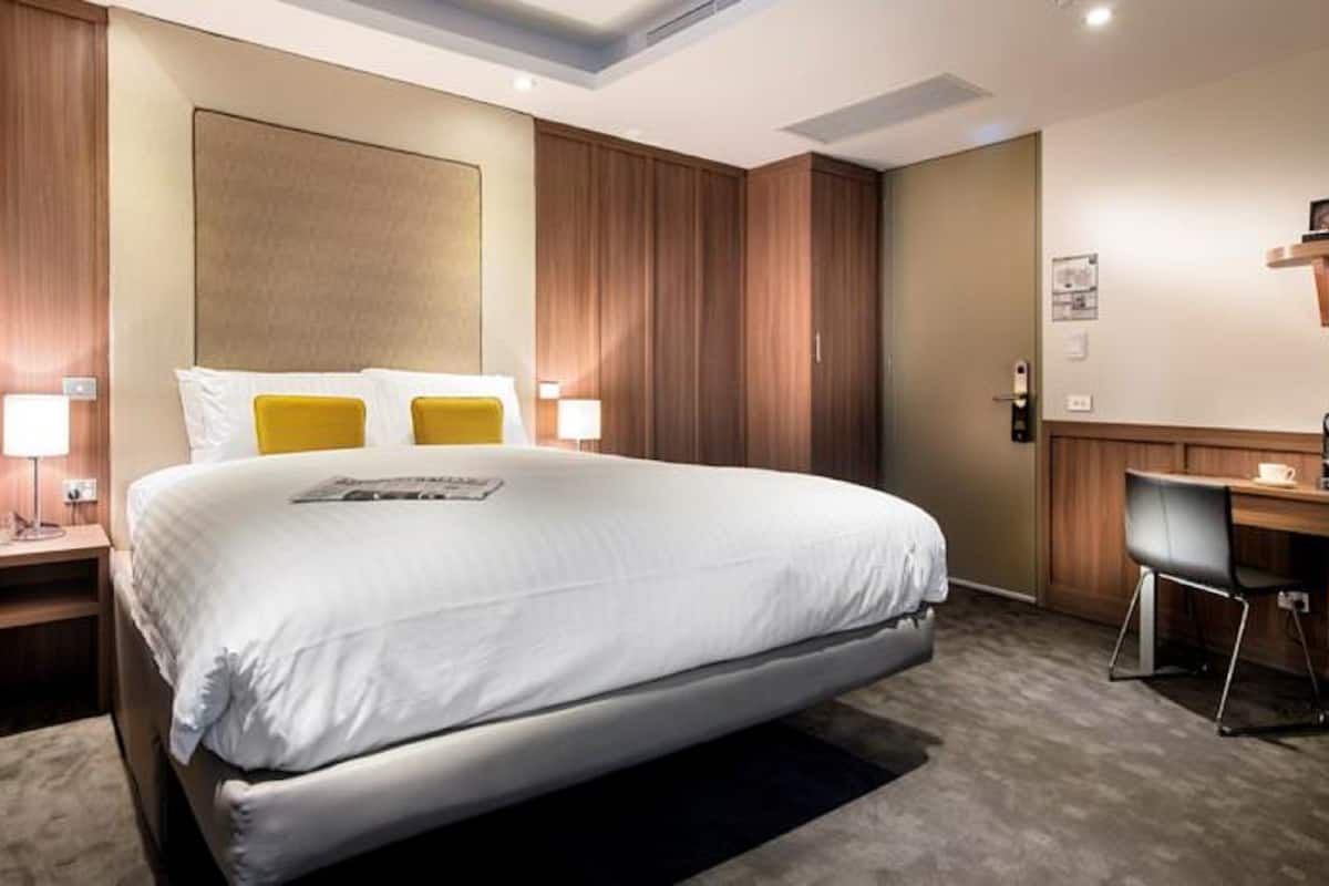 Habitación | Ropa de cama de alta calidad, camas con pillow-top y minibar