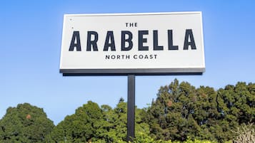 A sign with the text 'The Arabella North Coast'.