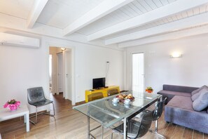 Family Suite, 2 Bedrooms | Living area | TV - Hotel La Pineta (Follonica)