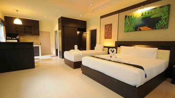 Triple Room, Garden View | Desk, blackout drapes, rollaway beds, free WiFi