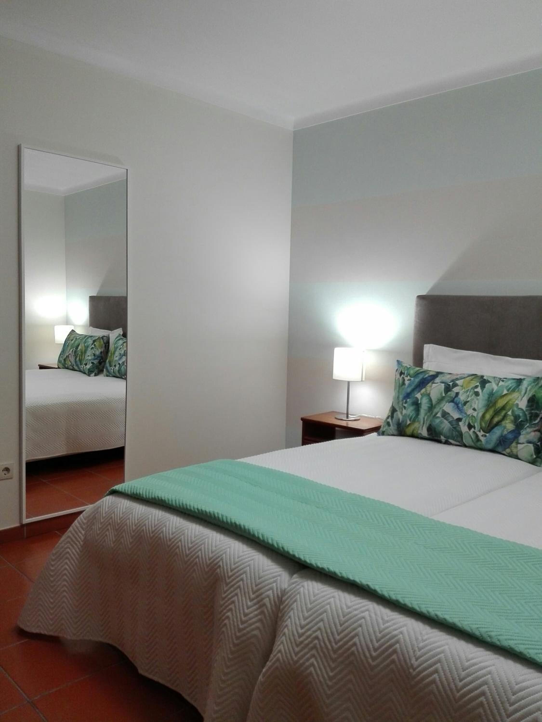 premium bedding, iron/ironing board, free wifi, bed sheets