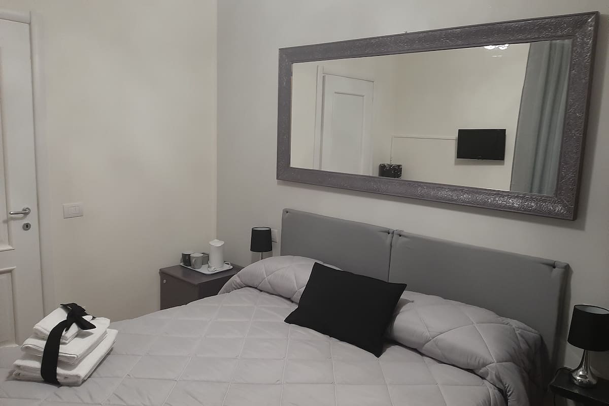 Economy Double Room | In-room safe, desk, blackout curtains, iron/ironing board