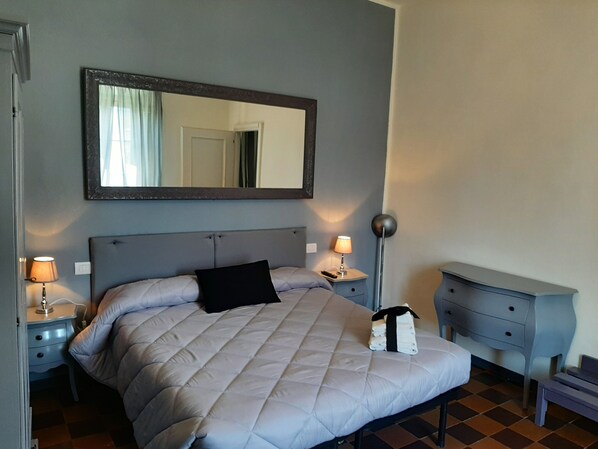 Family Room | In-room safe, desk, blackout drapes, iron/ironing board