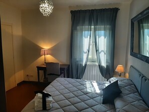 Economy Quadruple Room | In-room safe, desk, blackout drapes, iron/ironing board - Principe Calaf 3 (Lucca)