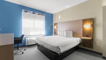 Premium bedding, individually furnished, desk, laptop workspace