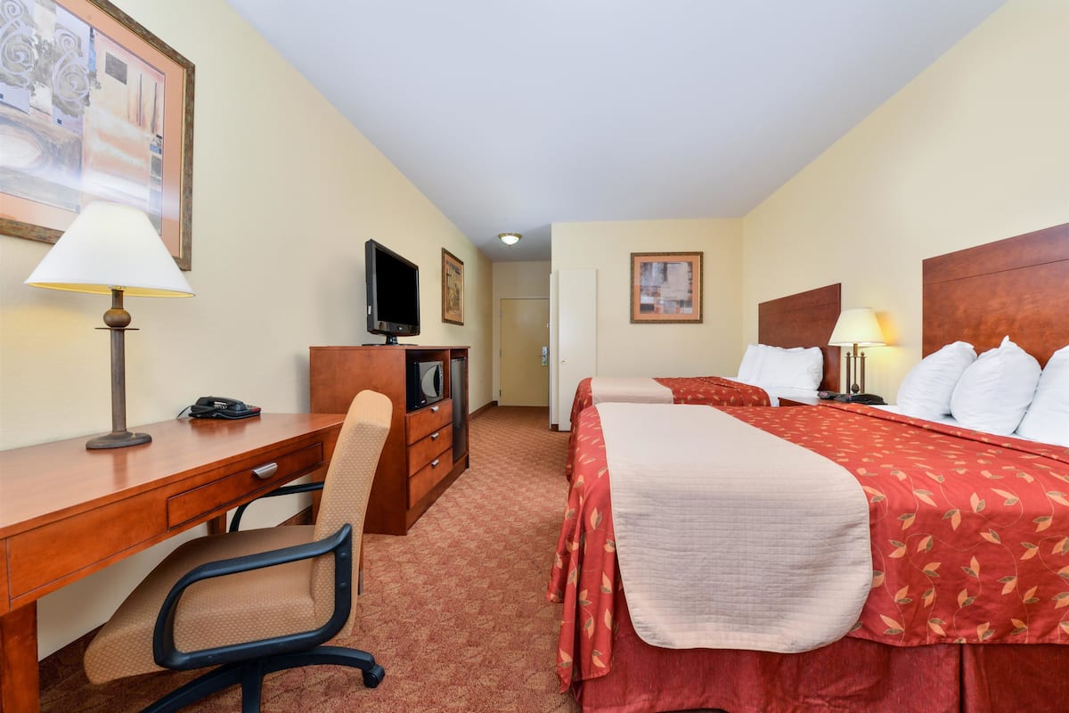 Premium bedding, individually furnished, desk, laptop workspace
