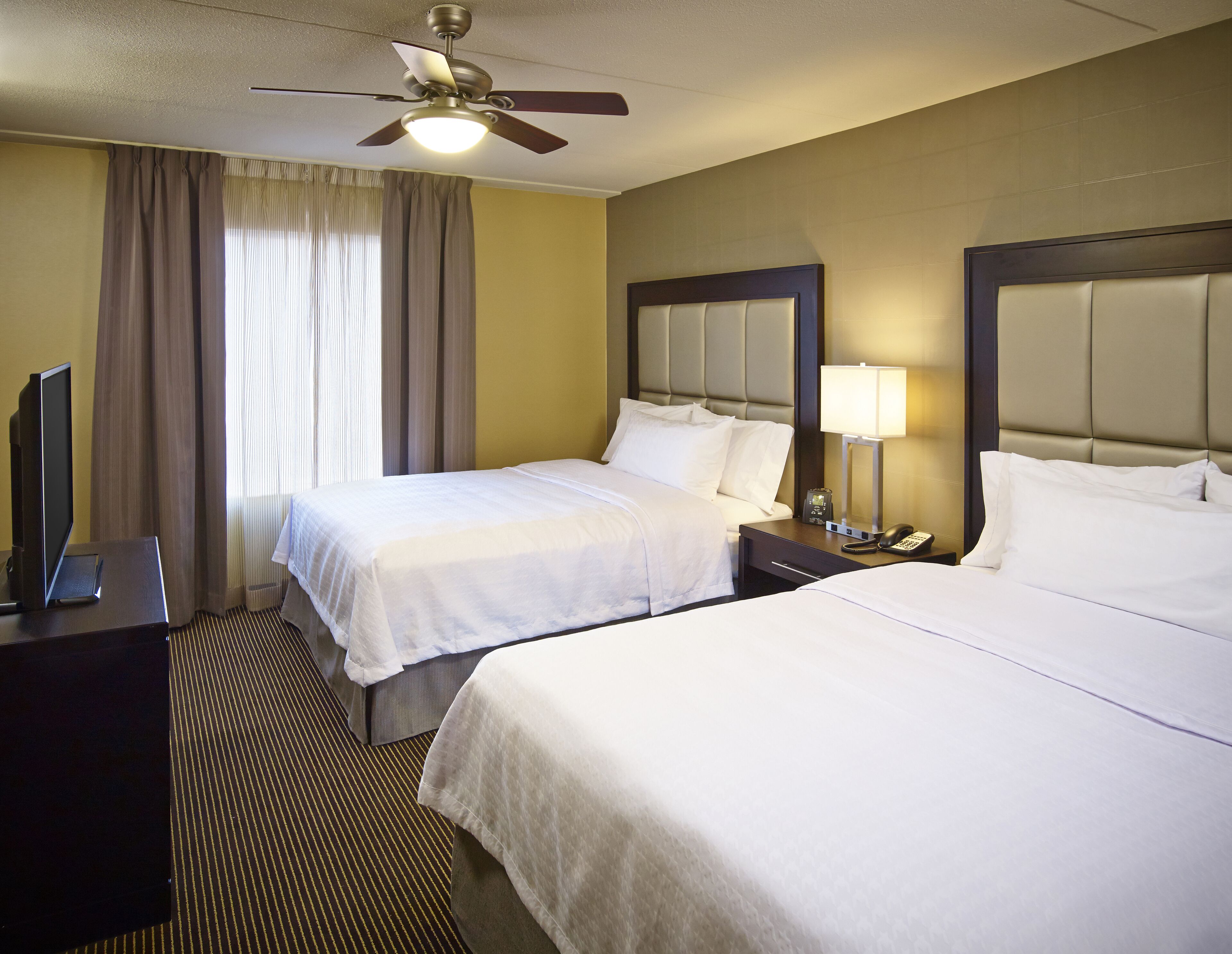 Iron/ironing board, cribs (free), WiFi (free), bed sheets