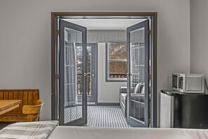 Family Room, Balcony, Mountain View | Desk, laptop workspace, blackout drapes, free WiFi - Canmore Rocky Mountain Inn (Canmore)