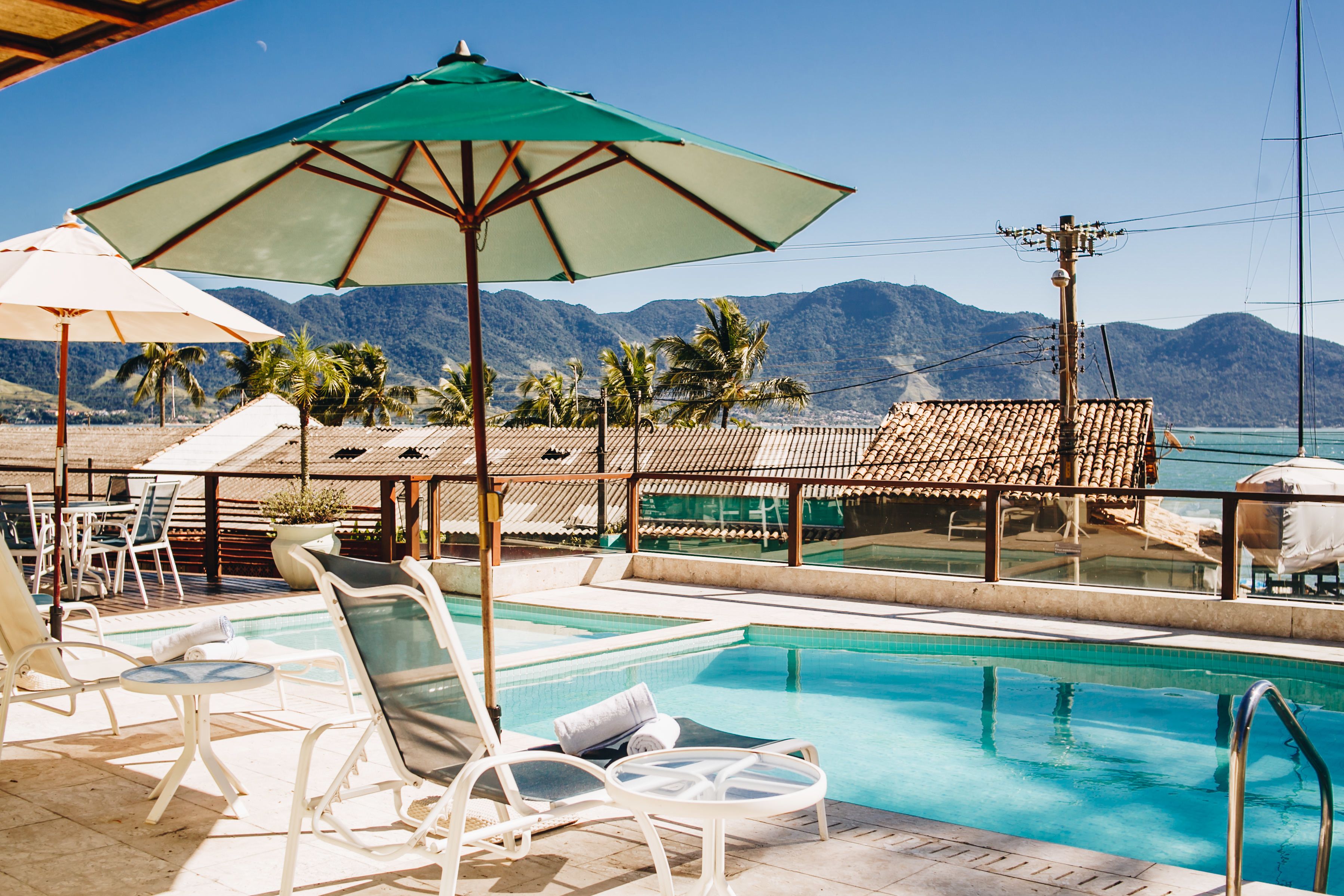 outdoor pool, pool umbrellas, pool loungers